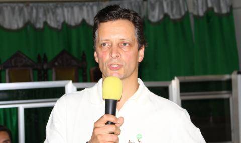 Nicko Debenham giving a speech at special event