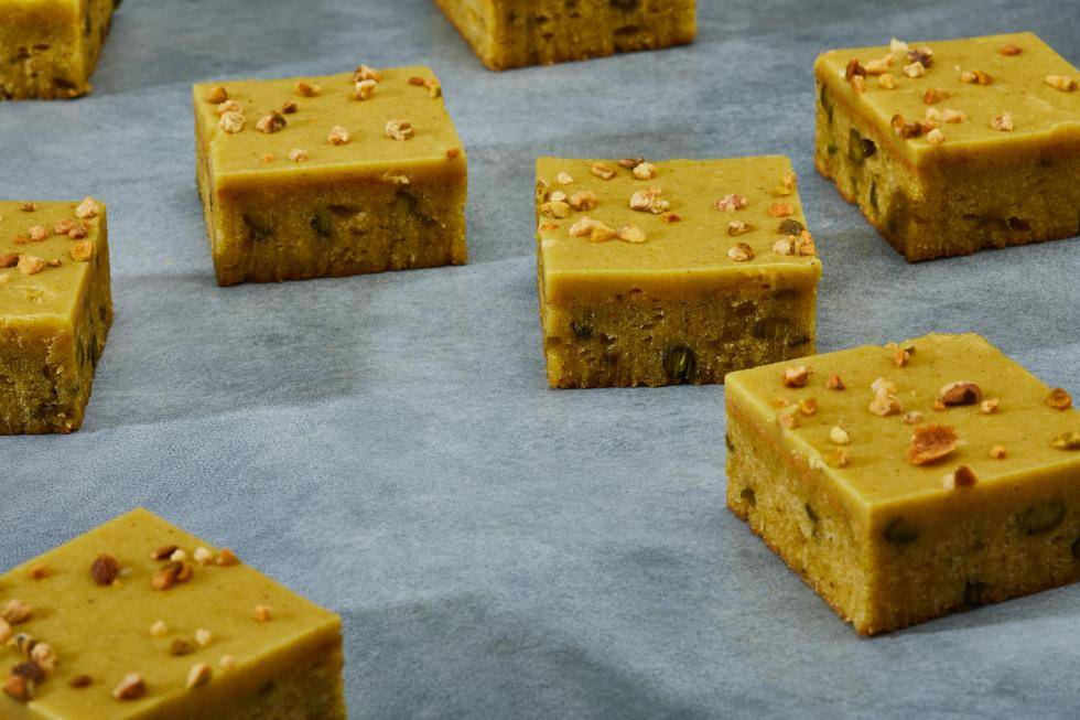 Pistachio blondies on a grey-ish surface
