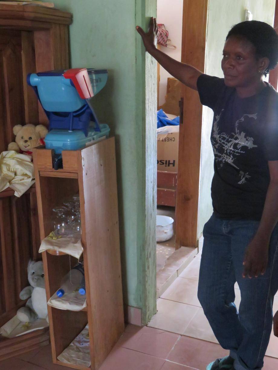 Barry Callebaut Water for Life champions during Cameroon cocoa study tour - water filter in cocoa family on custom-made shelf