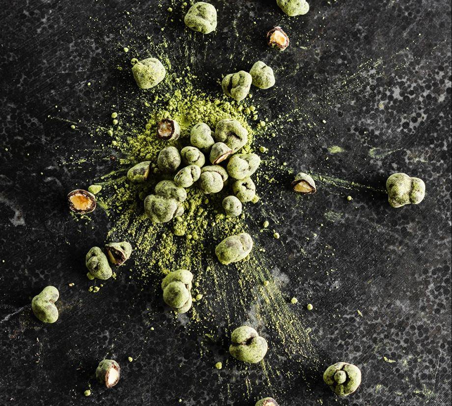 Hazelnuts covered with matcha chocolate
