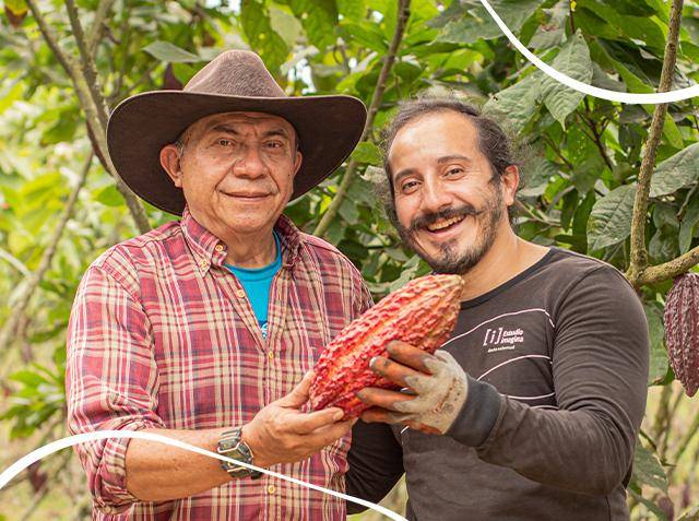 cacaofruit farmers holding a cacaofruit