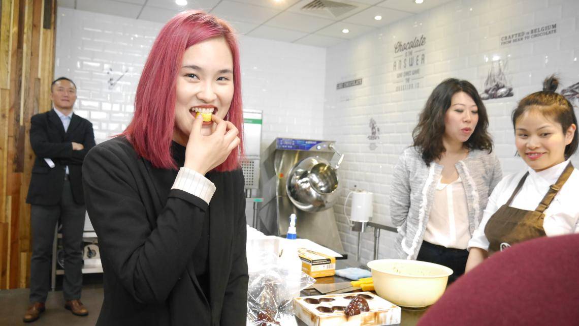 Happy consumer of chocolate in China